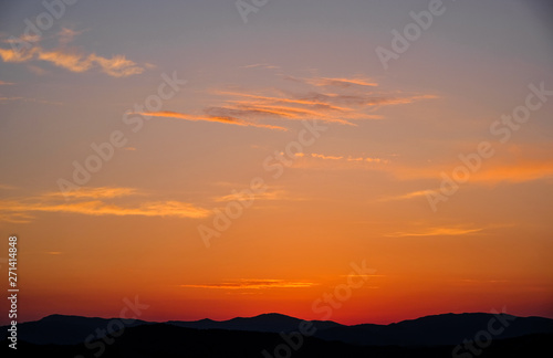Landscape of mountains at sunset. Beautiful sunset against the mountains