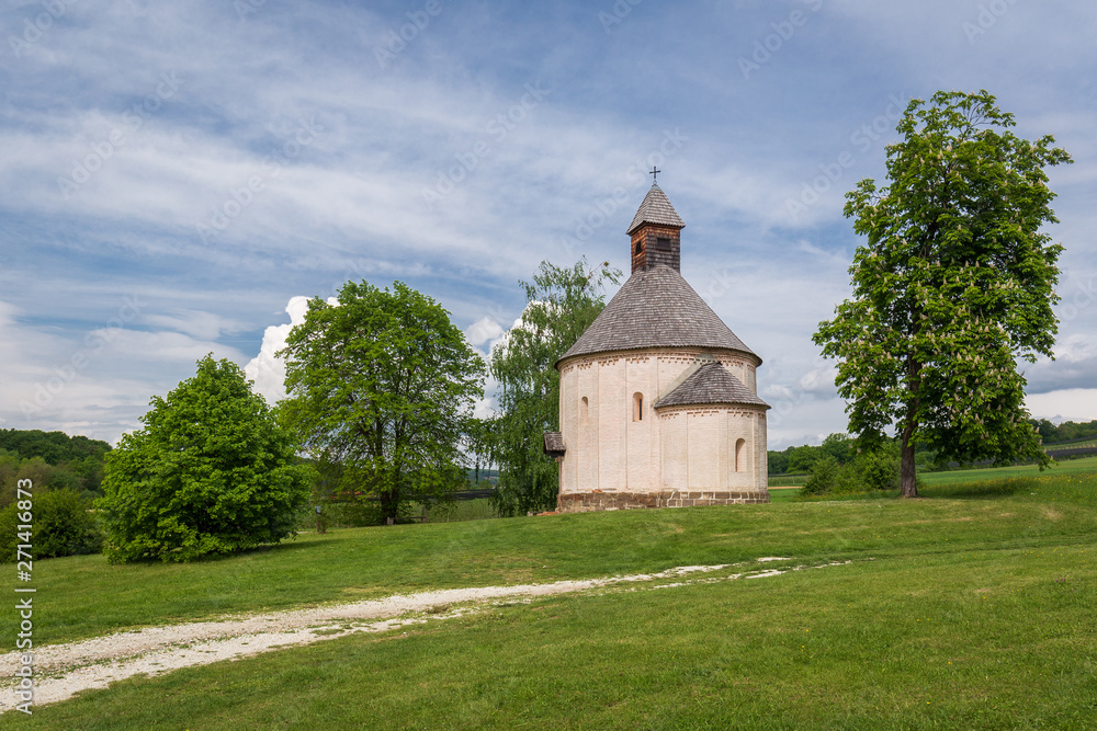 Saint Nicholas and Virgin Mary rotunda near dirt road, Slovenia