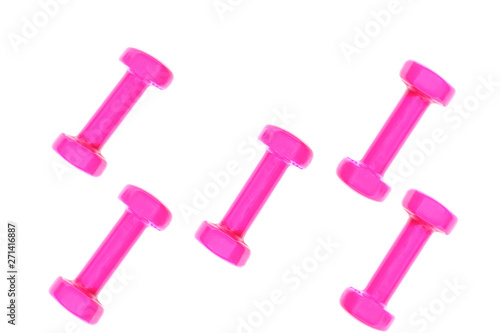 Pink dumbbell pattern on white background with copy space, isolated. Creative layout for sport fitness equipment concept. Minimal style, flat lay, top view. Copy space