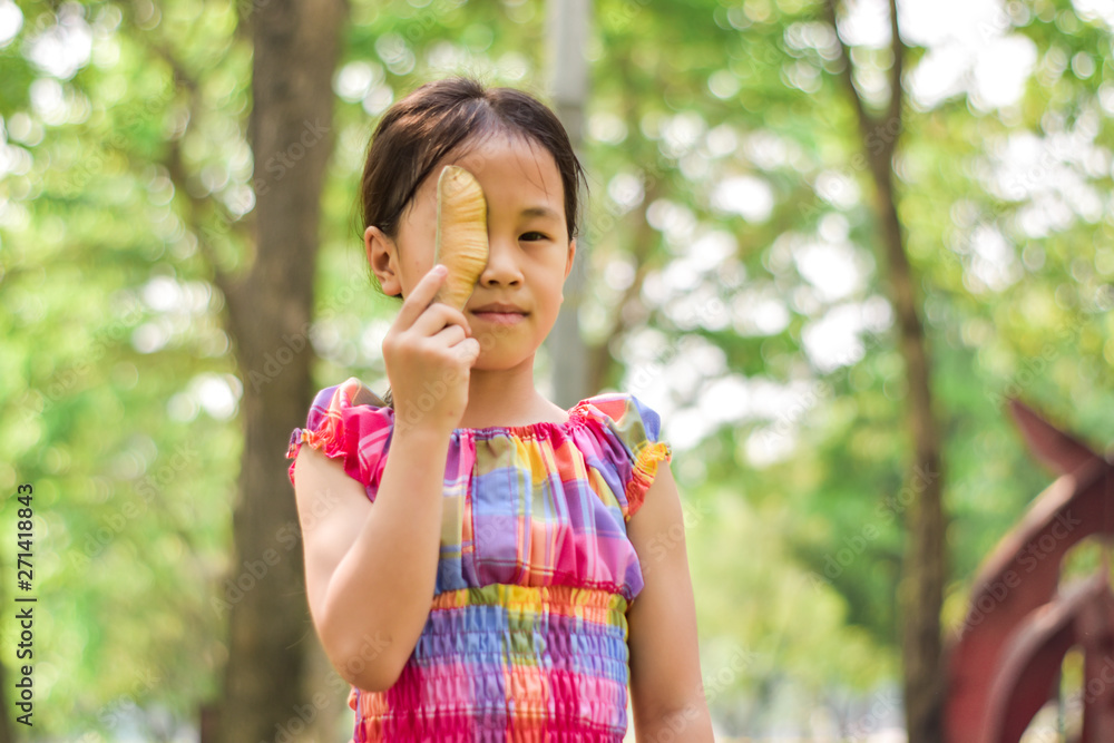 Portrait of a happy cute little girl outdoor. Summer concept.. Portrait of a happy cute little girl outdoor. Summer concept..