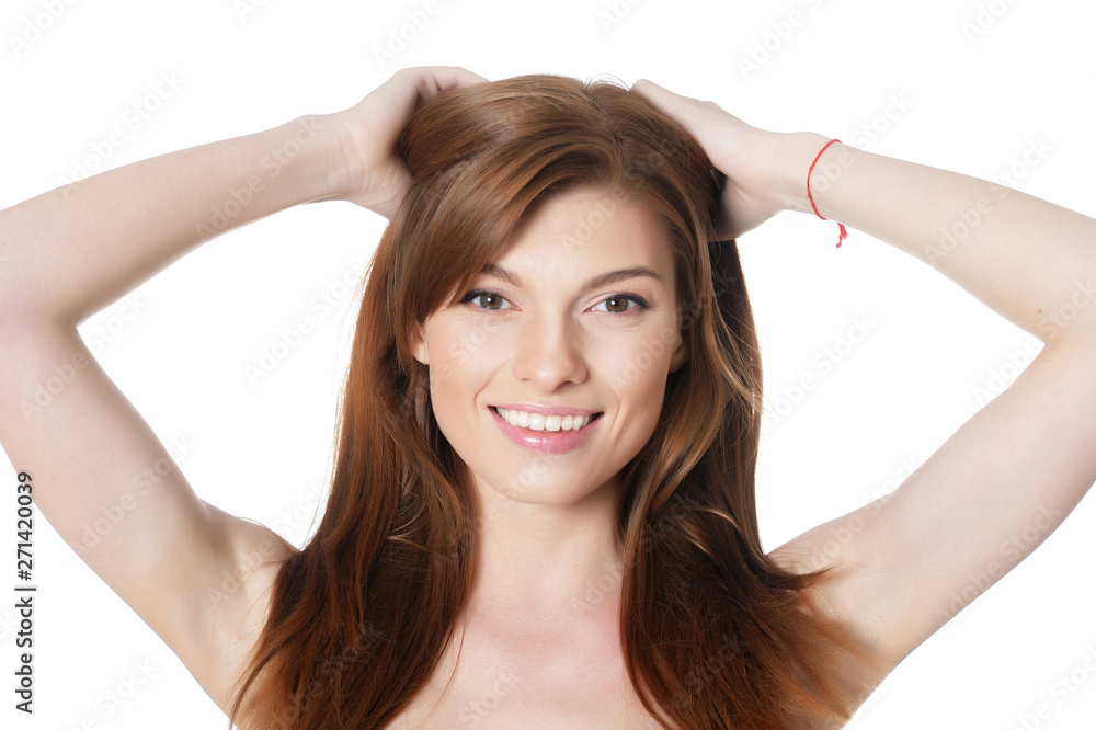 Close-up portrait of beautiful young woman with perfect skin on white background Close-up portrait of beautiful young woman with perfect skin on white background