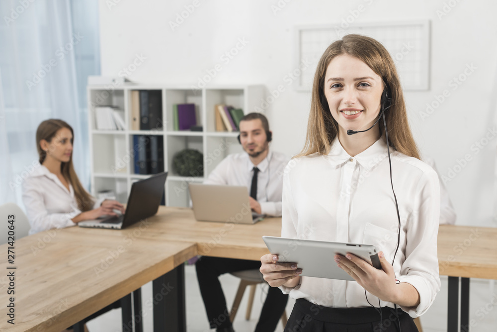 Portrait of woman working in call center Portrait of woman working in call center