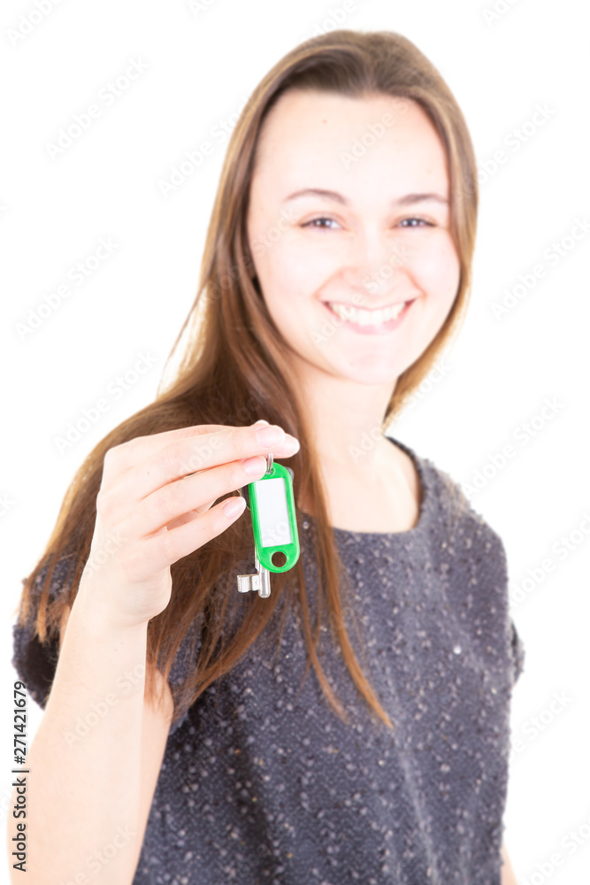 blurred selective focus beautiful business young real estate woman handing apartment house key blurred selective focus beautiful business young real estate woman handing apartment house key