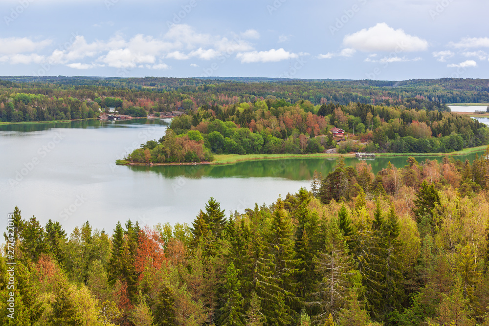 Aerial view of nature landscape with river and sea channel among the forest at Aland Islands, Finland Aerial view of nature landscape with river and sea channel among the forest at Aland Islands, Finland