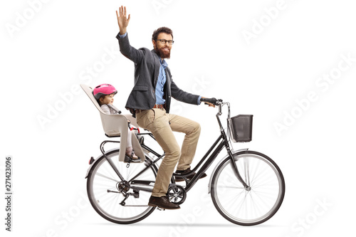 Father riding a child in a bicycle child's seat and waving at the camera