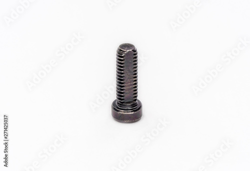 Black zinc coated  metric thread screw shot on white.