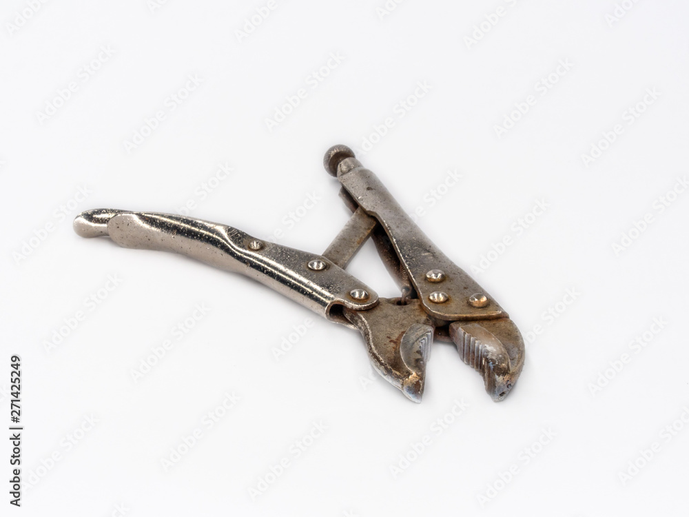 Old rusty Vise Grip Locking Pliers shot on white. Old rusty Vise Grip Locking Pliers shot on white.