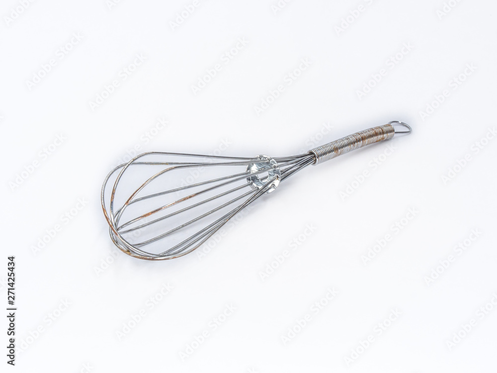 Old hand wire mixer shot on white. Old hand wire mixer shot on white.