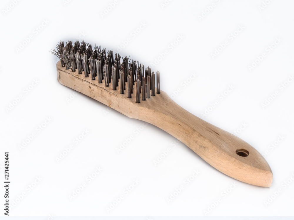 Wire brush on wooden handle shot on white. Wire brush on wooden handle shot on white.