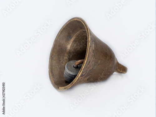 Vintage bronze bell shot on white.