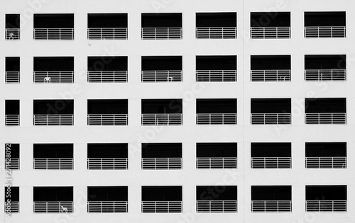 black and white architecture building with balcony