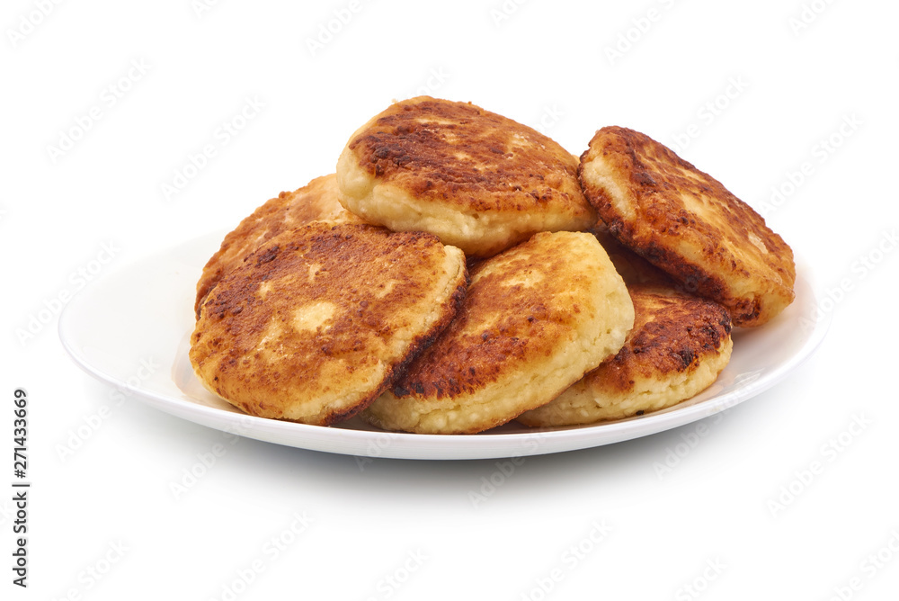 Cottage cheese pancakes, close-up, isolated on white background