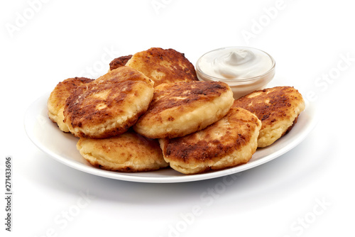 Cottage cheese pancakes, close-up, isolated on white background © GSDesign