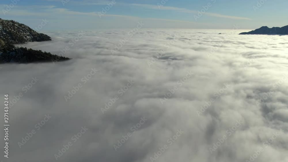 Aerial Shot Sea Of Clouds And Mountain Peaks Aerial Shot Sea Of Clouds And Mountain Peaks