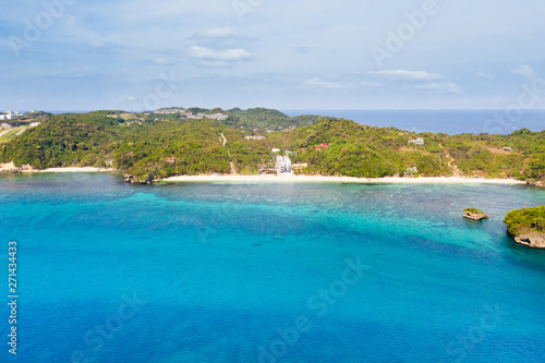 Ilig Iligan Beach. White sand beach and clear coral lagoon. Coast of the island of Boracay, Philippines, top view.
