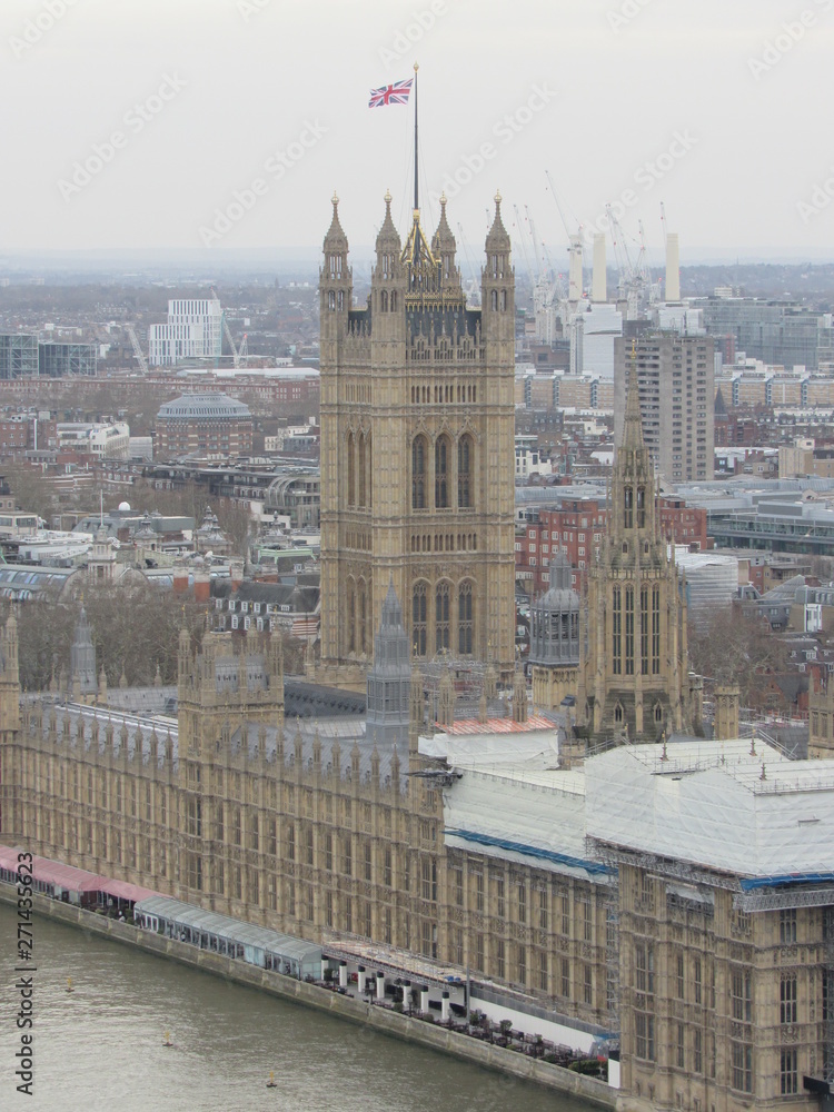 View of the Palace of Westminster from the top of the London Eye on a cloudy day 