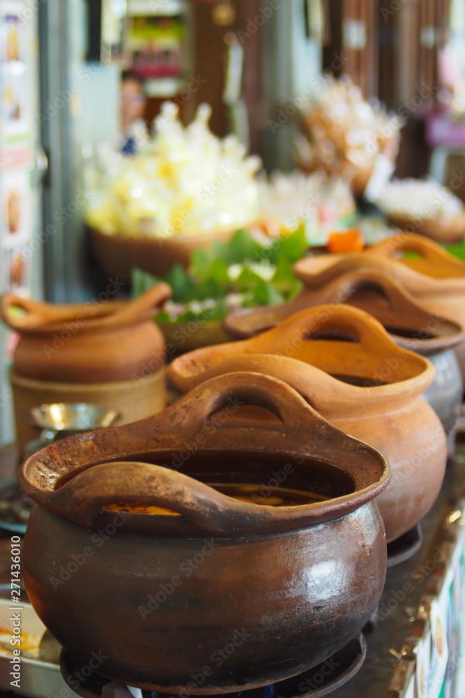 Fototapeta premium Pot for food, made from pottery, packed food sold in Thai food street