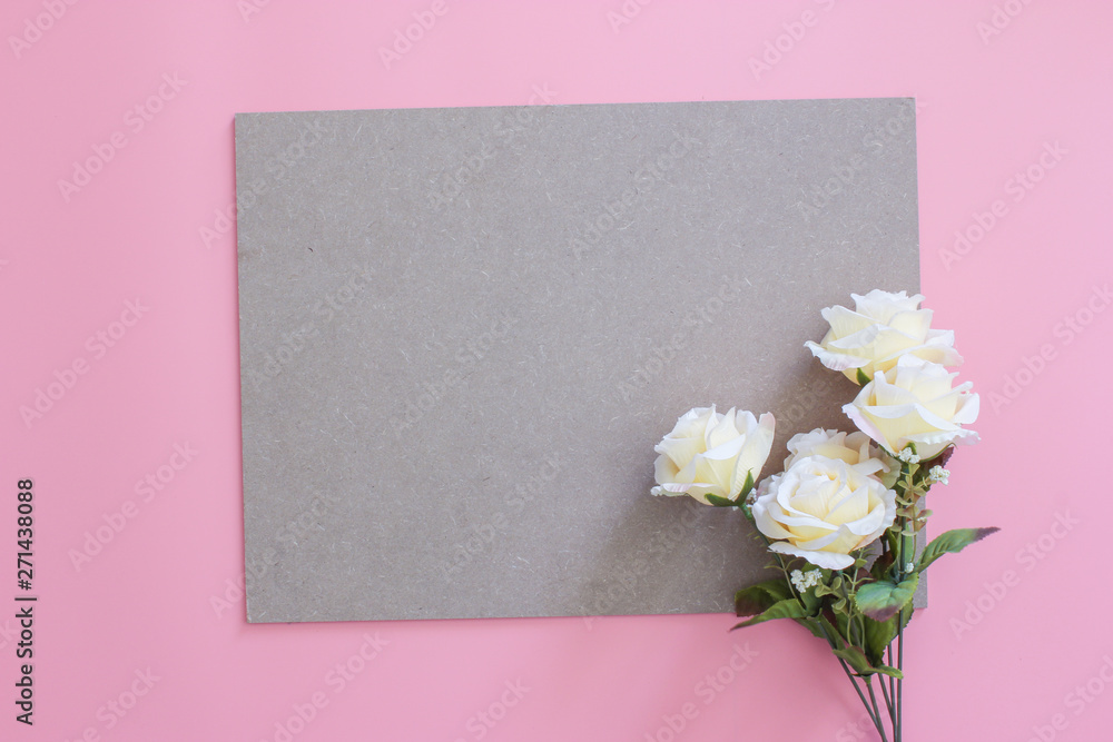Flower and frame wood board on pink background