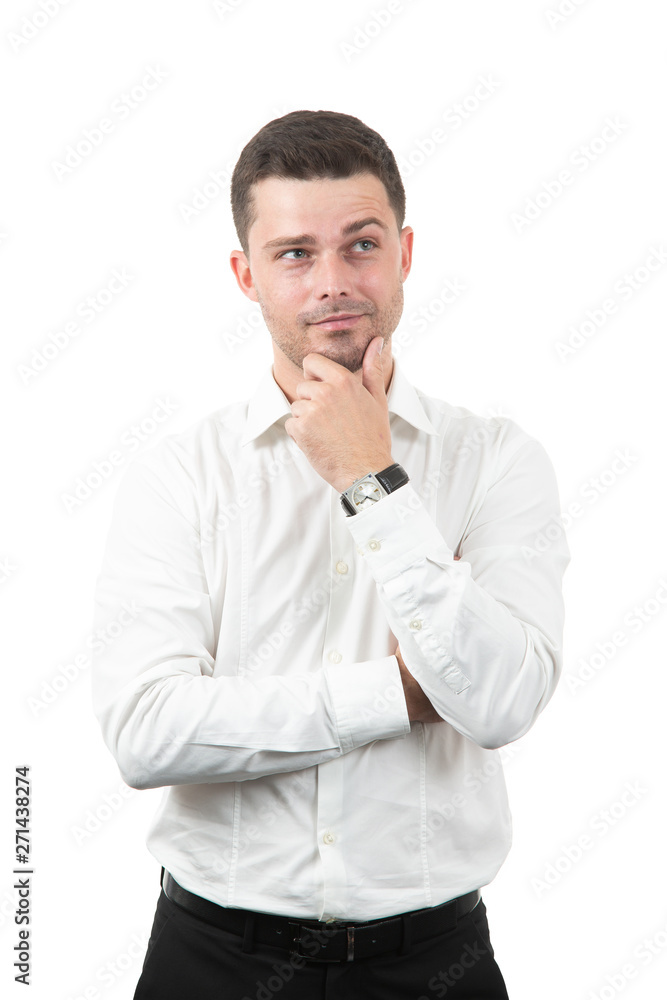 Smiling corporate guy thinking of new ideas Smiling corporate guy thinking of new ideas