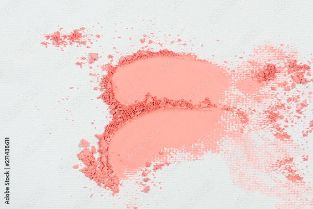 Fototapeta premium Eye shadow or bronzer pink smudge on white background.