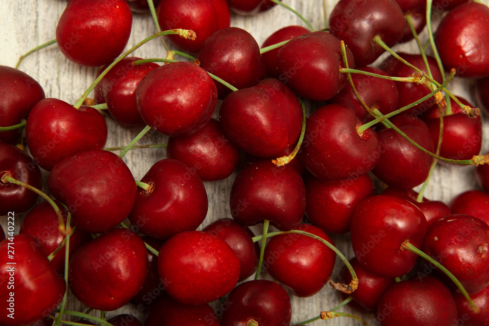 cherry on a wooden background close-up cherry on a wooden background close-up