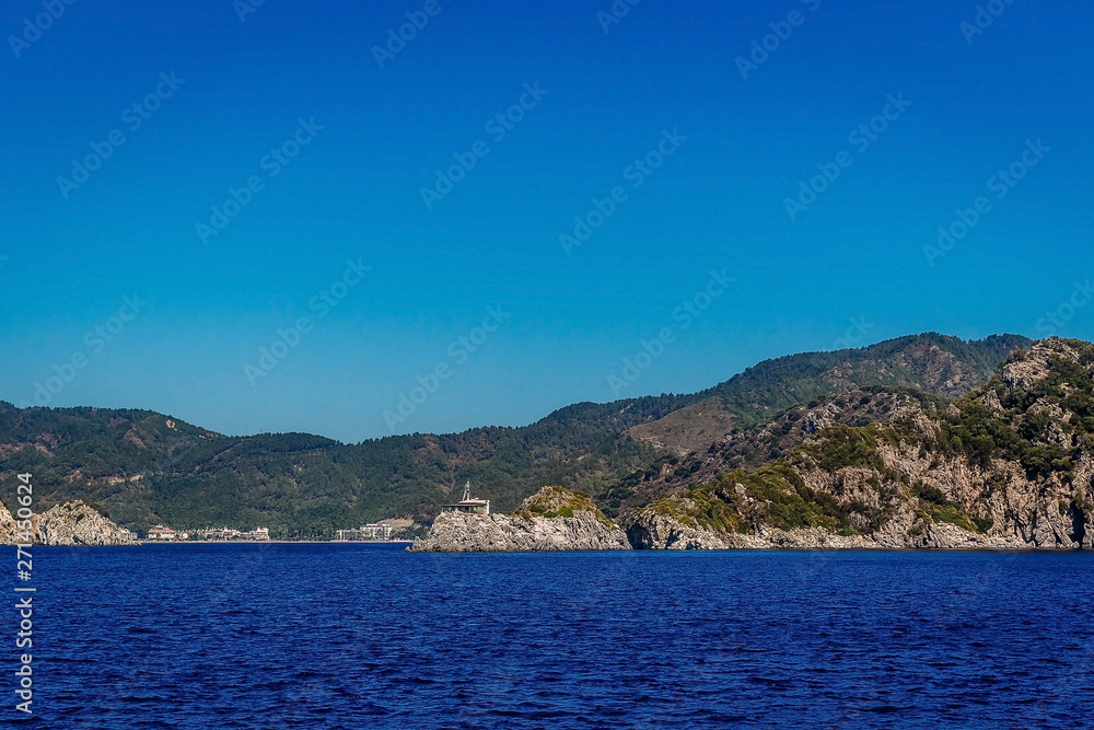 blue sky, high mountains and blue sea of Marmaris in summer. Stunning seascape of Turkey.