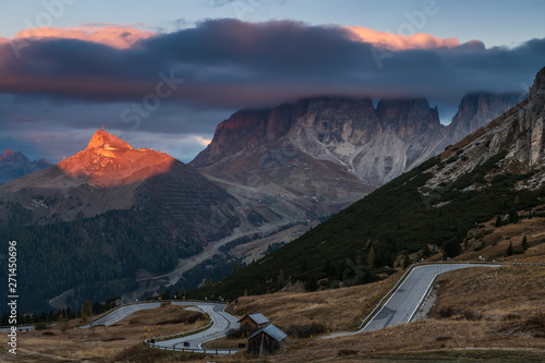 Beautiful alpine countryside. Scenic image of famous Sassolungo peak with overcast perfect blue sky. Wonderful Vall Gardena under sunlight. Majestic Dolomites Mountains. Amazing nature Landscape