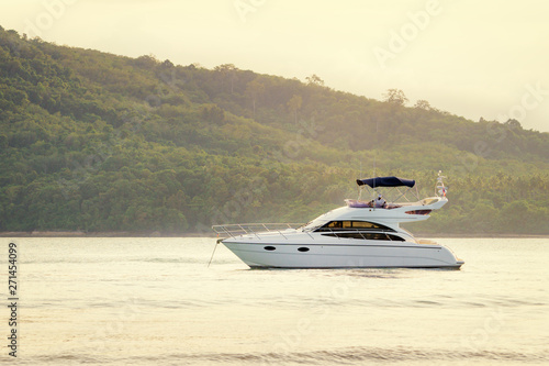 White modern motor yacht sailing the sea