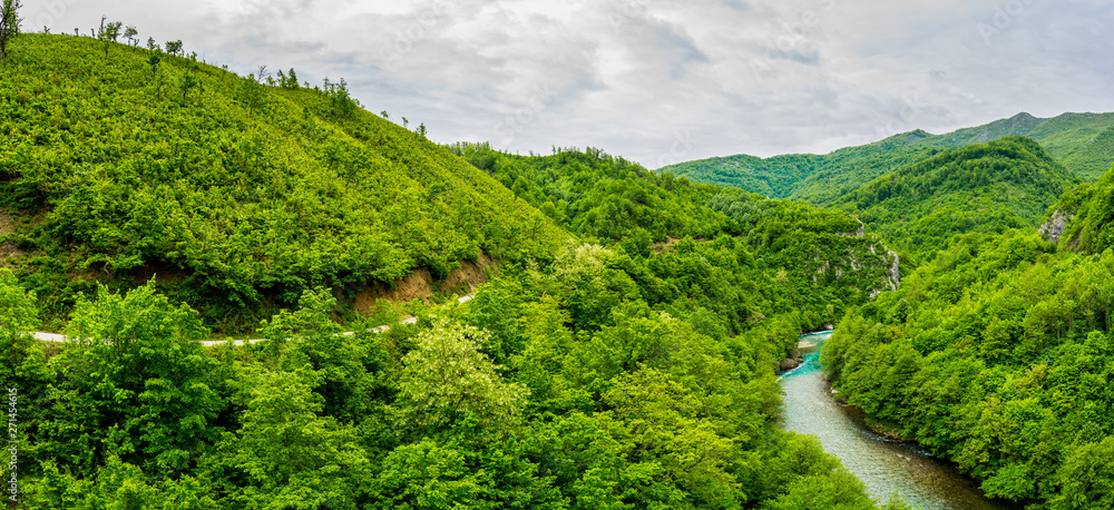 Montenegro, XXL panorama of blue moraca river waters in endless green mountainous nature landscape in moraca canyon