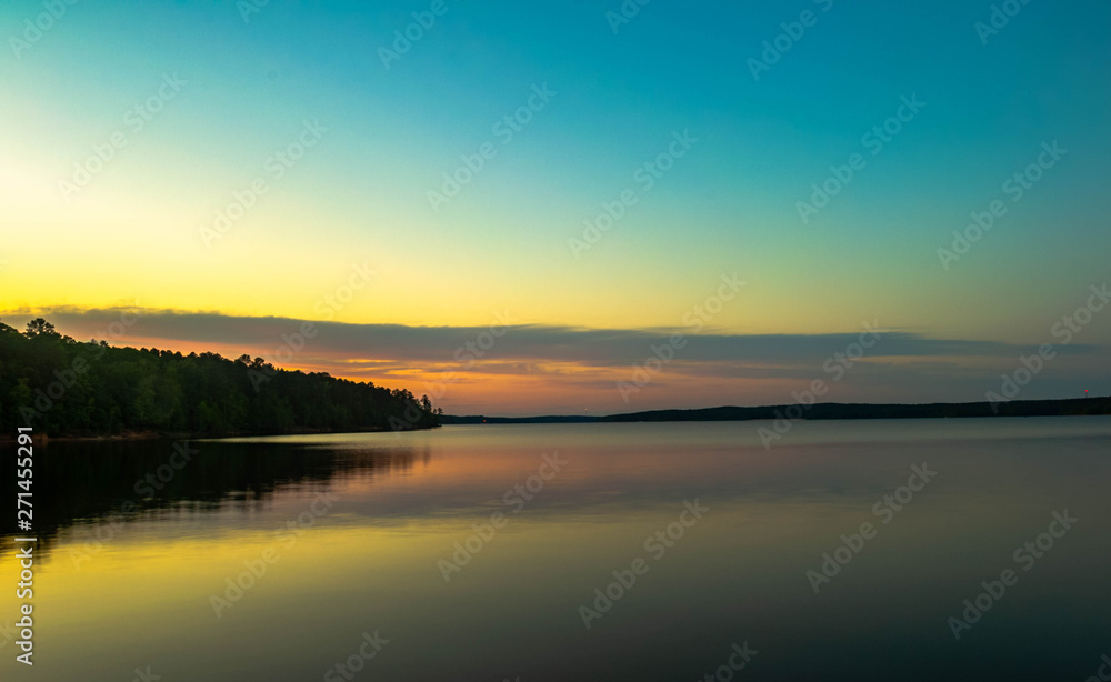 a vivid sunset on Falls Lake