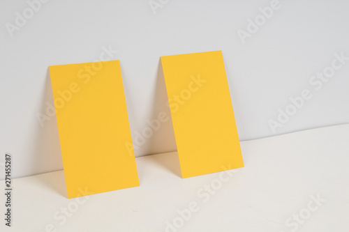 Blank golden business cards on the white background. Template for ID.