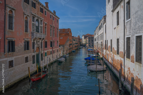 HDR photo of Rio del Gesulti canal in Venice with some boats