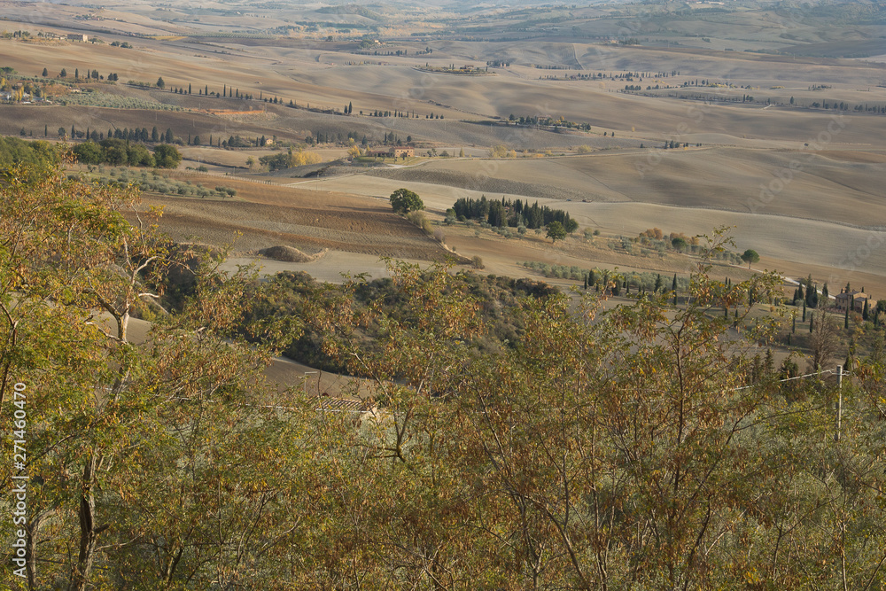 Fototapeta premium Countryside landscape. Countryside landscape with hills and a homestead; typical landscape of central Italy