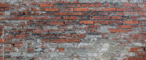 Old Weathered Brick Wall Covered With Concrete