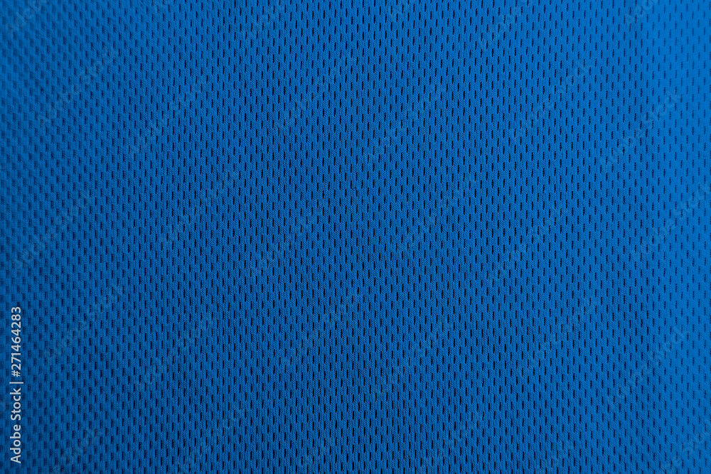 A uniformly lit blue fabric texture with soft shadows. A uniformly lit blue fabric texture with soft shadows.