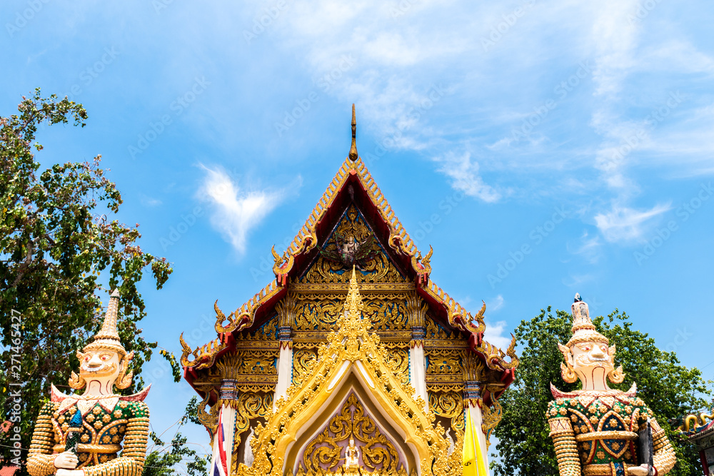 Fototapeta premium Temple roof. Architectural detail on roof of Thai temple. Beautiful architecture in Ancient buddhist temple