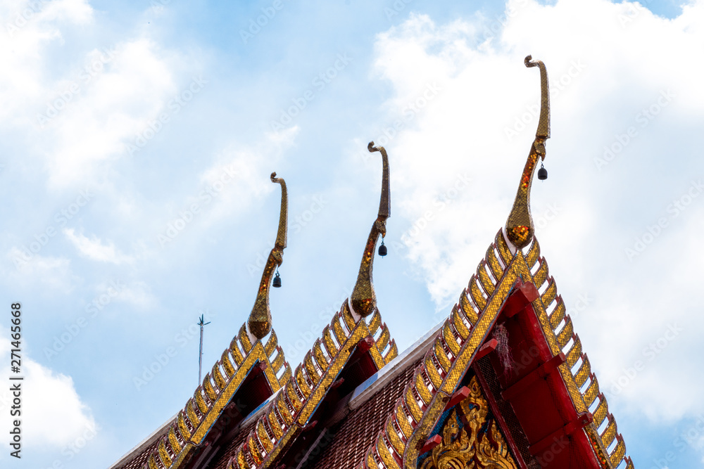 Temple roof. Architectural detail on roof of Thai temple. Beautiful architecture in Ancient buddhist temple