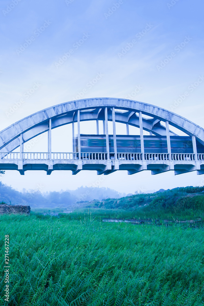 Old train passing Tha Chomphu ancient railway bridge. Old train passing Tha Chomphu ancient railway bridge.