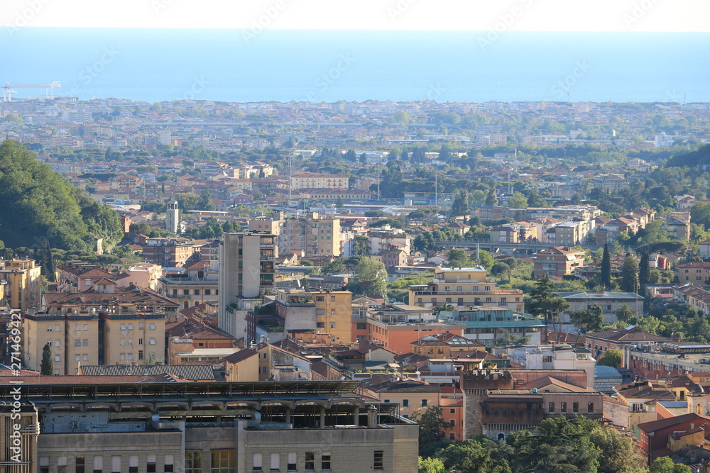 Panoramic view of the city of Carrara, at the foot of the Apuan