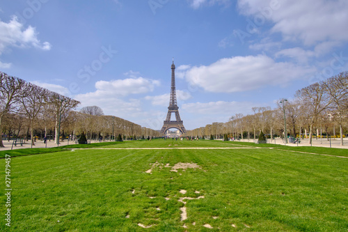 Scenic view of famous Eiffel Tower in old touristic historic city Paris. Beautiful summer happy look of most popular touristic attraction in ancient capital of France © Petr Zyuzin