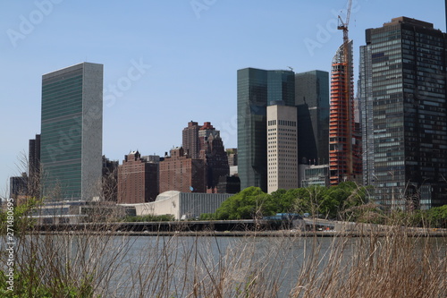New York, NY, USA - MAY 23, 2019 - United Nations Headquarters in New York City. uptown new york city united nations complex. United Nations Building view from Roosevelt Four Freedom park