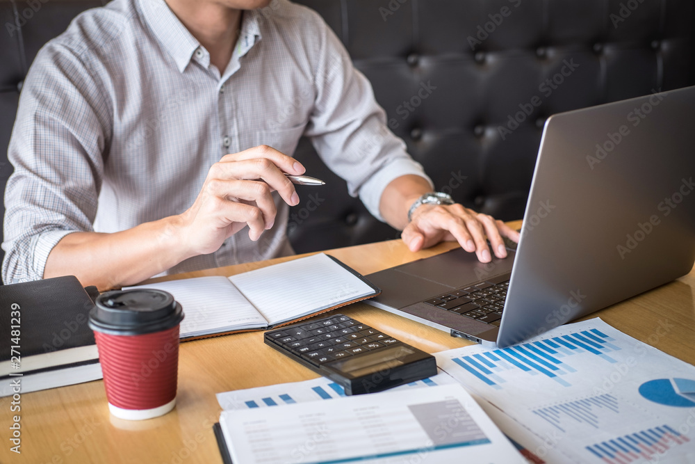 Businessman accountant working audit and calculating expense financial annual financial report balance sheet statement, doing finance making notes on paper checking document Businessman accountant working audit and calculating expense financial annual financial report balance sheet statement, doing finance making notes on paper checking document