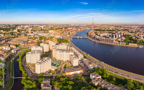 SAINT-PETERSBURG, RUSSIA - June 3, 2019: Beautiful aerial top view at new elite residential complex "Riverside" on the Ushakovskaya embankment on the banks of the Bolshaya Nevka river. View from drone