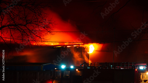 Картината върху платно Fire in factory building at night