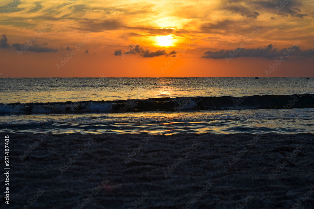 Romantic sunset sky and tropical sea at dusk