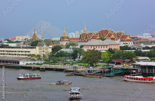 Distant view of The Grand Palace next to Chao Phraya River in Bangkok.