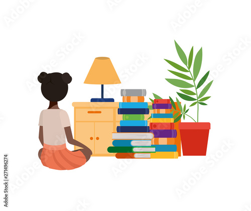 woman sitting with stack of books