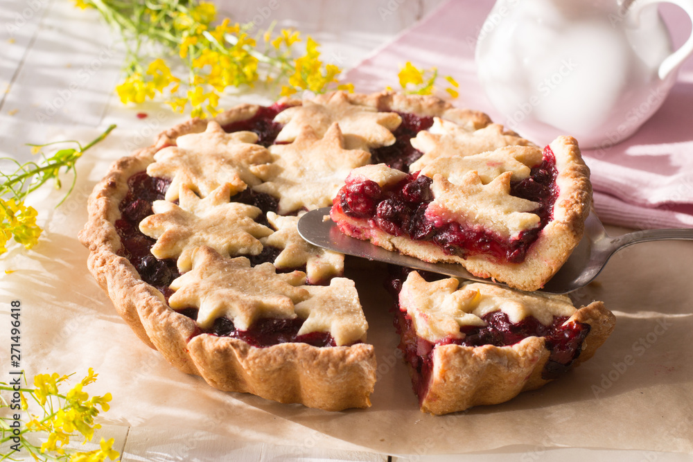 Cherry tart on wooden table Cherry tart on wooden table