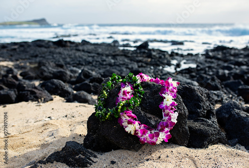 Wedding Leis on Rocks at Oahu Hawaii Beach