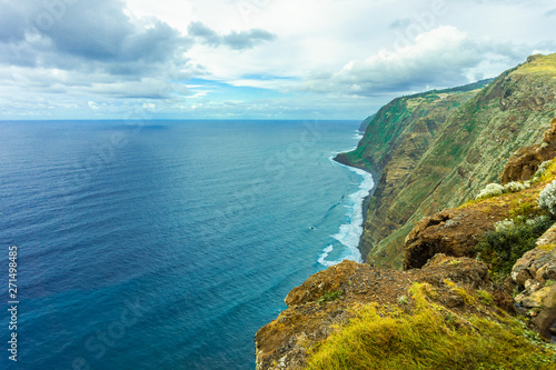 Rocky coast of the Atlantic ocean at Madeira archipelago in Portugal